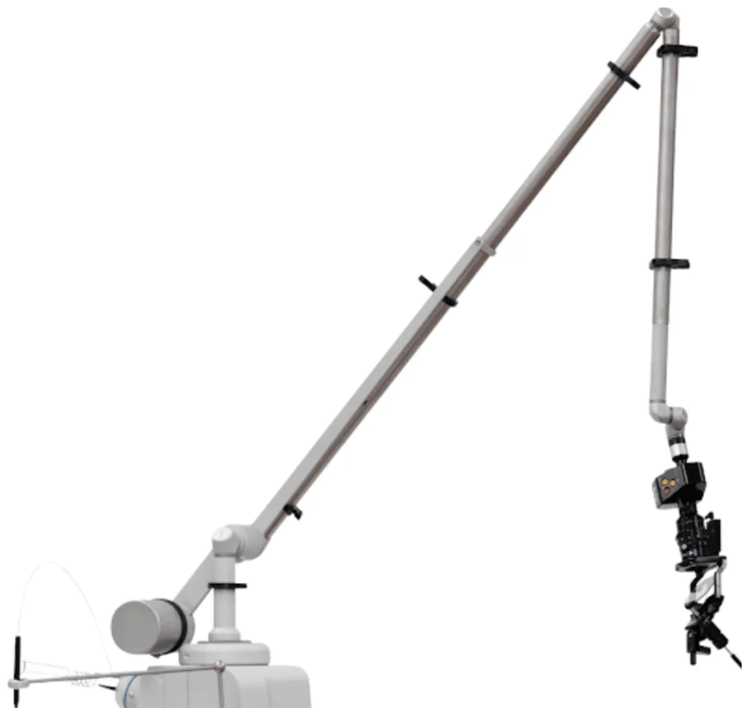 DEKA SmartXide² TRIO 43-inch titanium articulated arm with micromanipulator, mounted on the CO₂ laser console